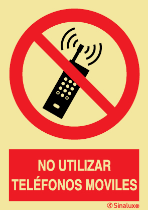 Señal de prohibición con el pictograma y texto de prohibido utilizar teléfonos móviles