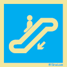 Señal informativa con el pictograma de escalera mecánica descendente a la izquierda