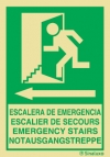 Señal de evacuación con el pictograma y textos en cuatro lenguas de ESCALERA DE EMERGENCIA y flecha hacia la izquierda