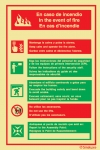 Señal con instrucciones de seguridad contra incendios en tres lenguas