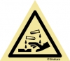 Señal de peligro con el pictograma de substancias corrosivas