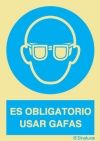 Señal de obligación con el pictograma y texto de obligatorio el uso de gafas