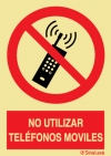 Señal de prohibición con el pictograma y texto de prohibido utilizar teléfonos móviles