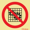 Señal de prohibición con el pictograma de prohibido trabajar sin el dispositivo de seguridad