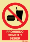 Señal de prohibición con el pictograma y texto de prohibido comer y beber